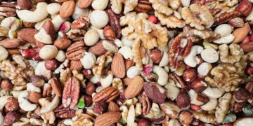 Confirmed—nuts are the healthiest snack for your heart and weight, but eating too many can ruin your diet and digestion
