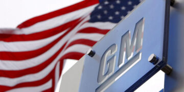 General Motors (GM) promised a fast ride into the future with electric vehicles (EV). Instead, it’s hitting the brakes—and paying dearly. The company says it will take a $1.6 billion charge in the third quarter of 2025 after scaling back its EV plan. That decision lands in a market where demand is cooling and policy winds have shifted. GM, based in Detroit, has the broadest EV lineup in the United States and holds a 13.8% market share, second to Tesla’s 43.1%. Yet the payoff hasn’t matched the investment. The U.S. auto industry is still finding its EV footing, and rivals like Ford Motor are facing similar pain. Analysts from CFRA Research and Bank of America, including Garrett Nelson and John Murphy, see a tougher road ahead. Politics matter here, too: the $7,500 tax credit that encouraged buyers under President Joe Biden was later scrapped by the administration of Donald Trump, changing the math for consumers and carmakers alike. Add tariffs to the mix, and the picture gets even more complicated. The headline? An ambitious strategy met a smaller-than-expected market—and the bill has arrived. What’s in the $1.6 Billion? (The Mechanics Behind the Hit) GM’s filing lays out the breakdown. The company recorded “non-cash impairment and other charges of $1.2 billion as a result of adjustments to our EV capacity,” while another $400 million will be cash charges tied to canceling contracts and settling commercial agreements linked to EV investments. In plain terms, GM built up for a level of EV demand that hasn’t materialized and now has to resize factories, supplier deals, and timelines. Why now? The market is smaller than expected, and the policy tailwinds that once supported rapid adoption have slowed. In October 2021, GM outlined a $35 billion budget for EV and autonomous technology by 2025, then scaled back. The company also explicitly acknowledged it now expects “adoption rates of EVs to slow,” citing market and policy changes, including the end of the $7,500 tax credit. That shift matters: incentives lower prices, and without them, buyers hesitate—especially when charging access, resale values, and battery costs feel uncertain. Outside voices agree the charge wasn’t a shock. “The charge doesn’t come as a surprise given recent market developments and the fact GM had made probably the most aggressive EV push of any traditional automaker,” said Garrett Nelson of CFRA Research. It’s a reminder that going first can be expensive when the curve bends. A Wider Squeeze: Competitors, Tariffs, and Caution Lights GM isn’t alone. Ford Motor also booked a $1.9 billion charge tied to its EV business. Analysts warn more could follow as the industry recalibrates to slower demand and more cautious investment. As John Murphy of Bank of America put it in June, “I think we’re going to see multibillion-dollar write-downs flooding the headlines for the next few years.” That’s not about failure so much as course correction: the U.S. auto industry invested for a boom and encountered a stepwise shift instead. There’s also the tariff factor. GM already took a $1.1 billion hit in the second quarter of 2025, which the company linked primarily to tariffs imposed by President Donald Trump. Tariffs raise costs somewhere in the chain—materials, components, or finished vehicles—and those dollars have to come from margins or consumer prices. In an EV market sensitive to every thousand dollars on the window sticker, that pressure bites. Meanwhile, Tesla continues to set the pace with scale and brand power, holding 43.1% market share. GM’s 13.8% share and widest range of EV models show commitment, but share alone doesn’t pay the bills. If volumes stall or incentives fade, high fixed costs can turn quickly into write-downs, especially when production capacity exceeds demand. What This Means for GM’s Next Moves (And How to Read the Signals) So where does GM go from here? The near-term playbook looks pragmatic: align capacity to demand, trim underperforming commitments, and preserve flexibility. The $1.6 billion charge, while painful, clears the deck for a slower rollout that better matches buyer interest. It also signals to suppliers and investors that plans will follow the market, not the other way around. Crucially, the company’s position remains strategically relevant. GM still offers the broadest EV lineup—a strength if and when demand re-accelerates. Detroit’s engineering base and manufacturing scale can pivot as conditions change. But expectations have to reset. Incentive-driven surges are not a stable foundation, and tariffs can shift costs in ways companies can’t fully control. For shoppers and observers, one message stands out: timing matters. Early bets are bold, but adoption curves are uneven. That’s normal in big technology transitions. The EV story is not a straight line; it’s a staircase. When one step is taller than expected, even giants stumble. Conclusion: A Costly Reset, Not the Endgame GM’s EV recalibration reads like a reality check, not a retreat. The company took a $1.6 billion charge to right-size its plans after demand softened and the $7,500 tax credit disappeared, compounding earlier tariff costs. The context is industrywide: Ford Motor recorded its own $1.9 billion charge, and analysts such as Garrett Nelson (CFRA Research) and John Murphy (Bank of America) expect more write-downs as the market sorts itself out. The lesson for the U.S. auto industry is straightforward: scale and incentives helped launch the EV era, but sustainable growth depends on steady demand, predictable policy, and careful cost control. GM still has assets that matter—brand, breadth, and manufacturing muscle—yet the path forward will likely be measured rather than meteoric. In that light, the charge is a strategic reset: clearing past assumptions, matching factory output to real orders, and preserving the option to accelerate when buyers are truly ready.